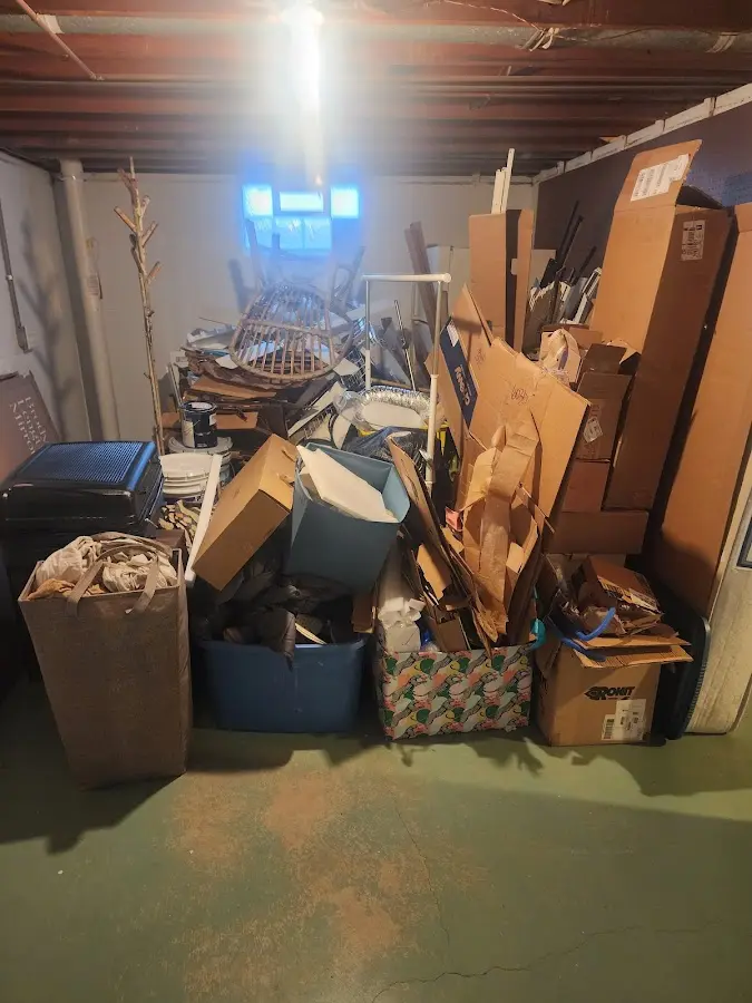 Roll-off dumpster container at job site for 2 Yard Dumpster Rental in Rollingwood